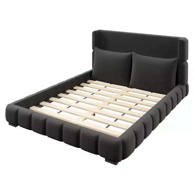 Lit plateforme rembourré avec 2 oreillers