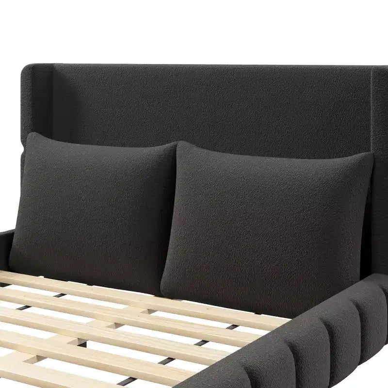 Lit plateforme rembourré avec 2 oreillers