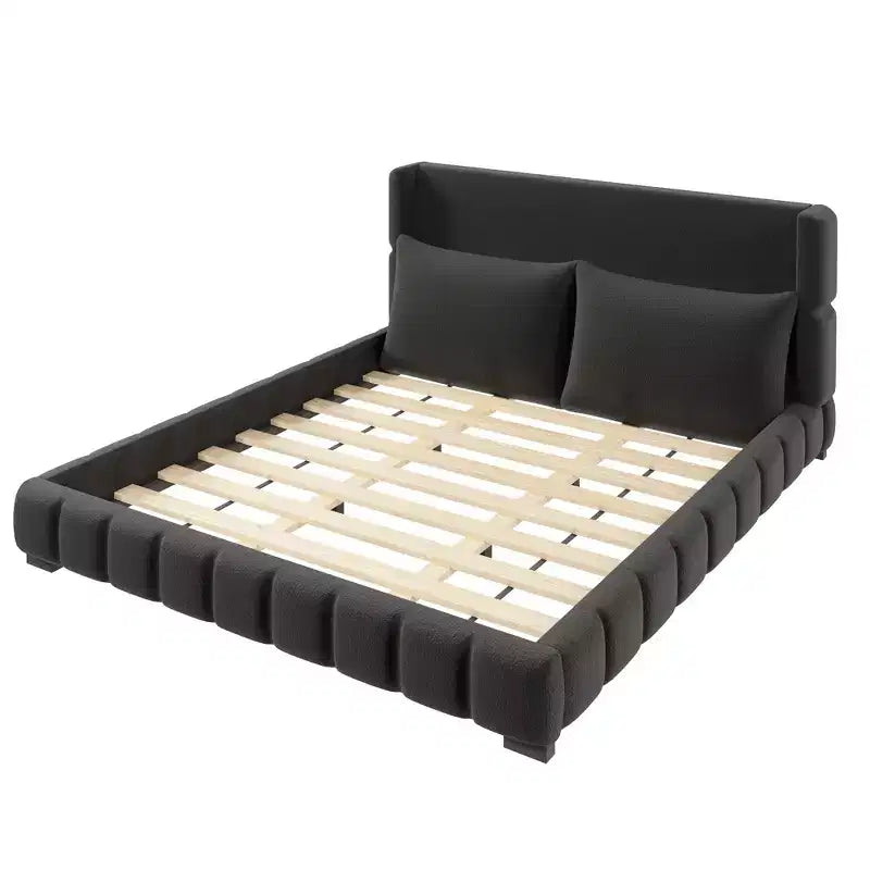 Lit plateforme rembourré avec 2 oreillers